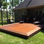 The new deck stained with the slightly darker frame