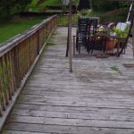 BEFORE: This deck is tattered and unsafe. (original to our home)